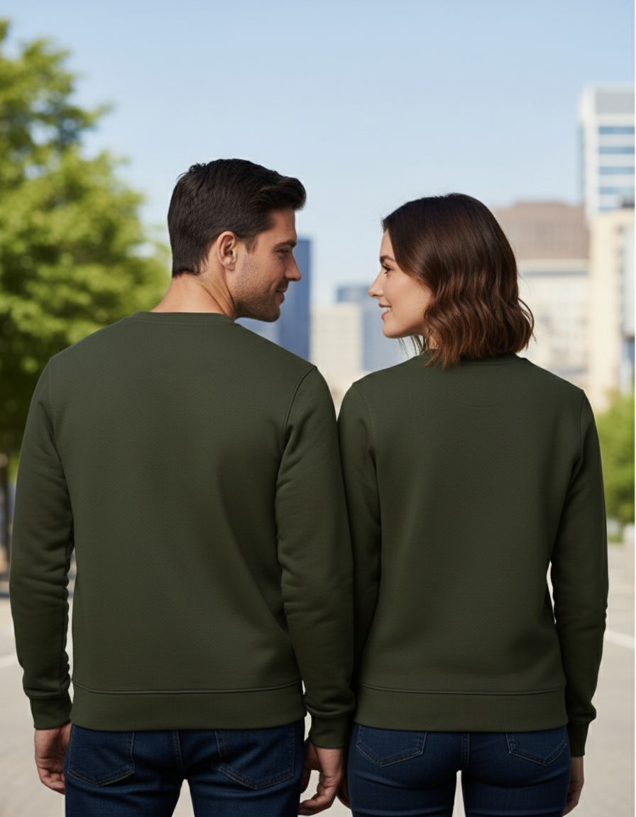 Back view of couple in olive green sweatshirts looking at each other